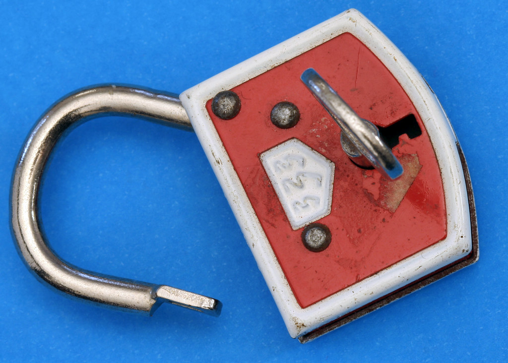 Padlock and key symbolizing account protection